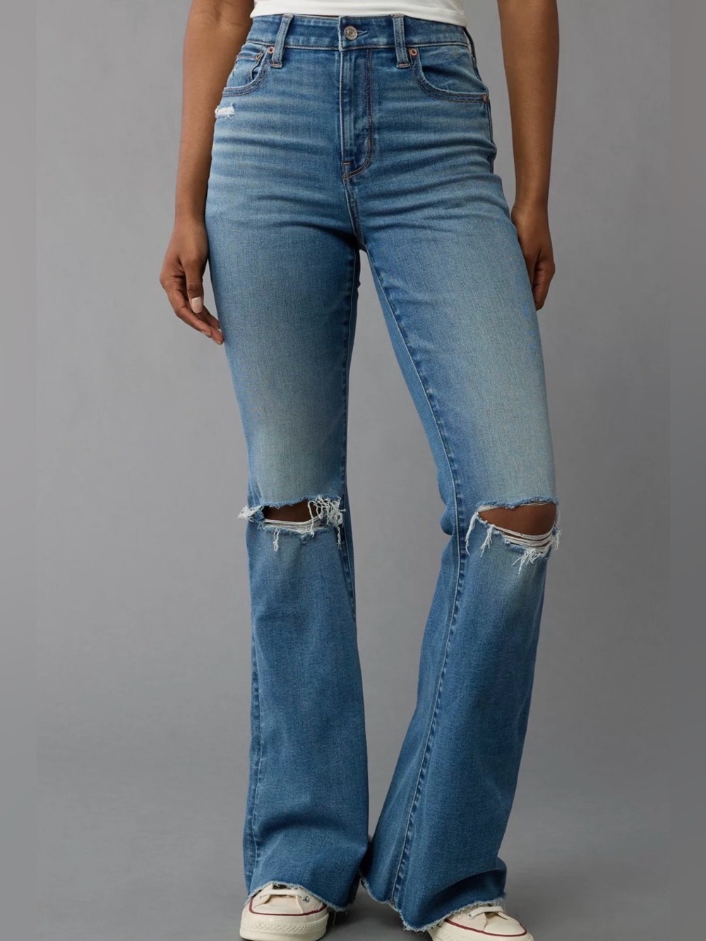 American Eagle Next Level Super High-Waisted Ripped Flare Jeans Tinted Blue